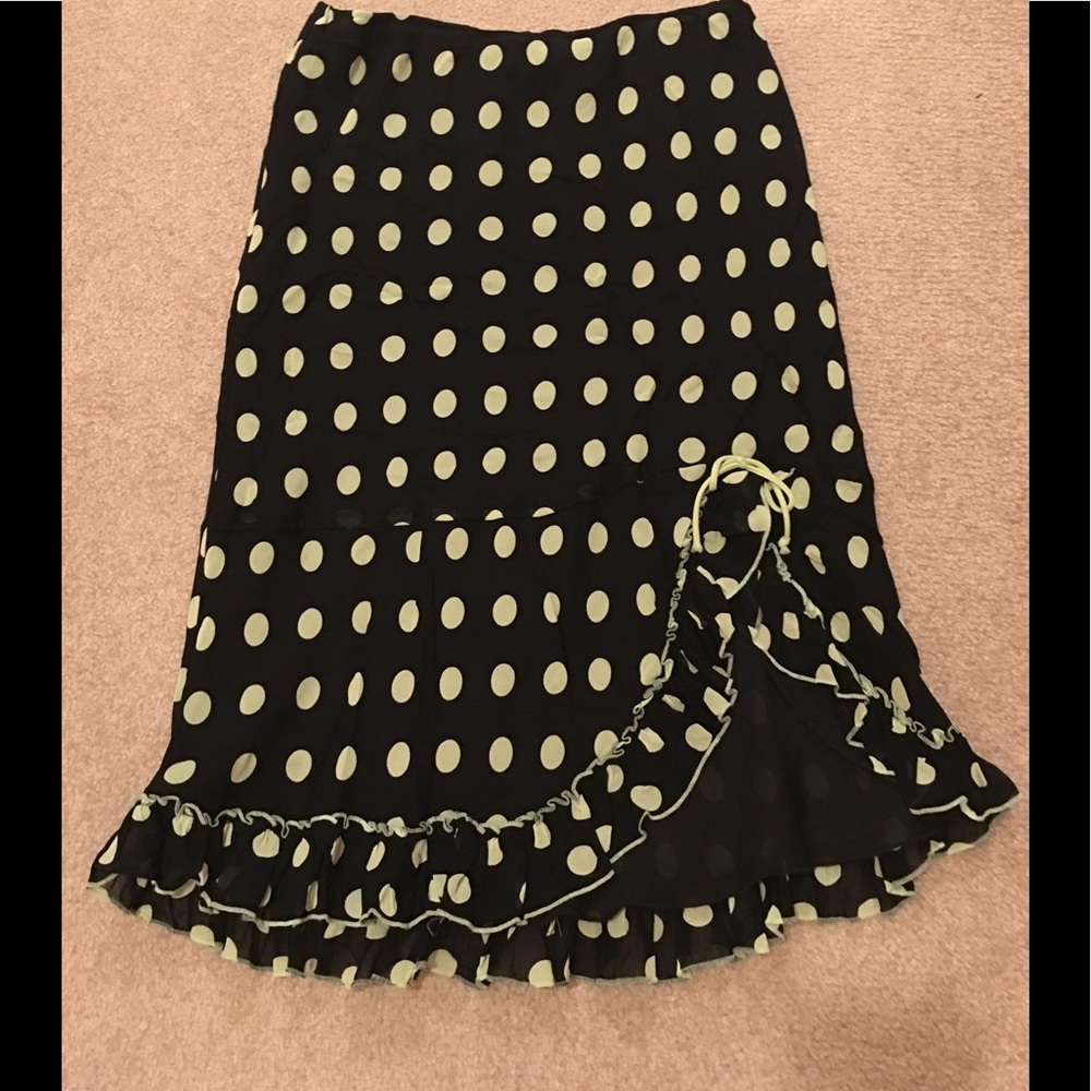 Green polka dotted black skirt